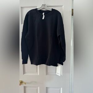 This Lululemon top is new with tags.